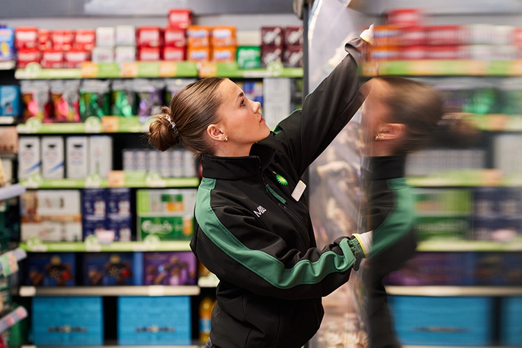 female colleague stacking items